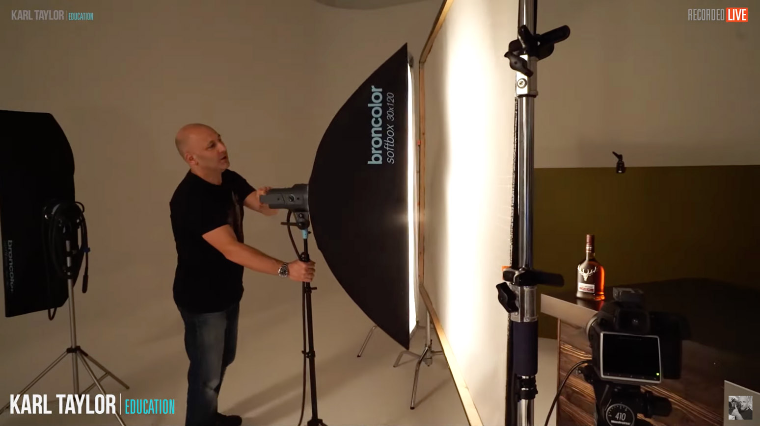 Positioning softbox with scrim