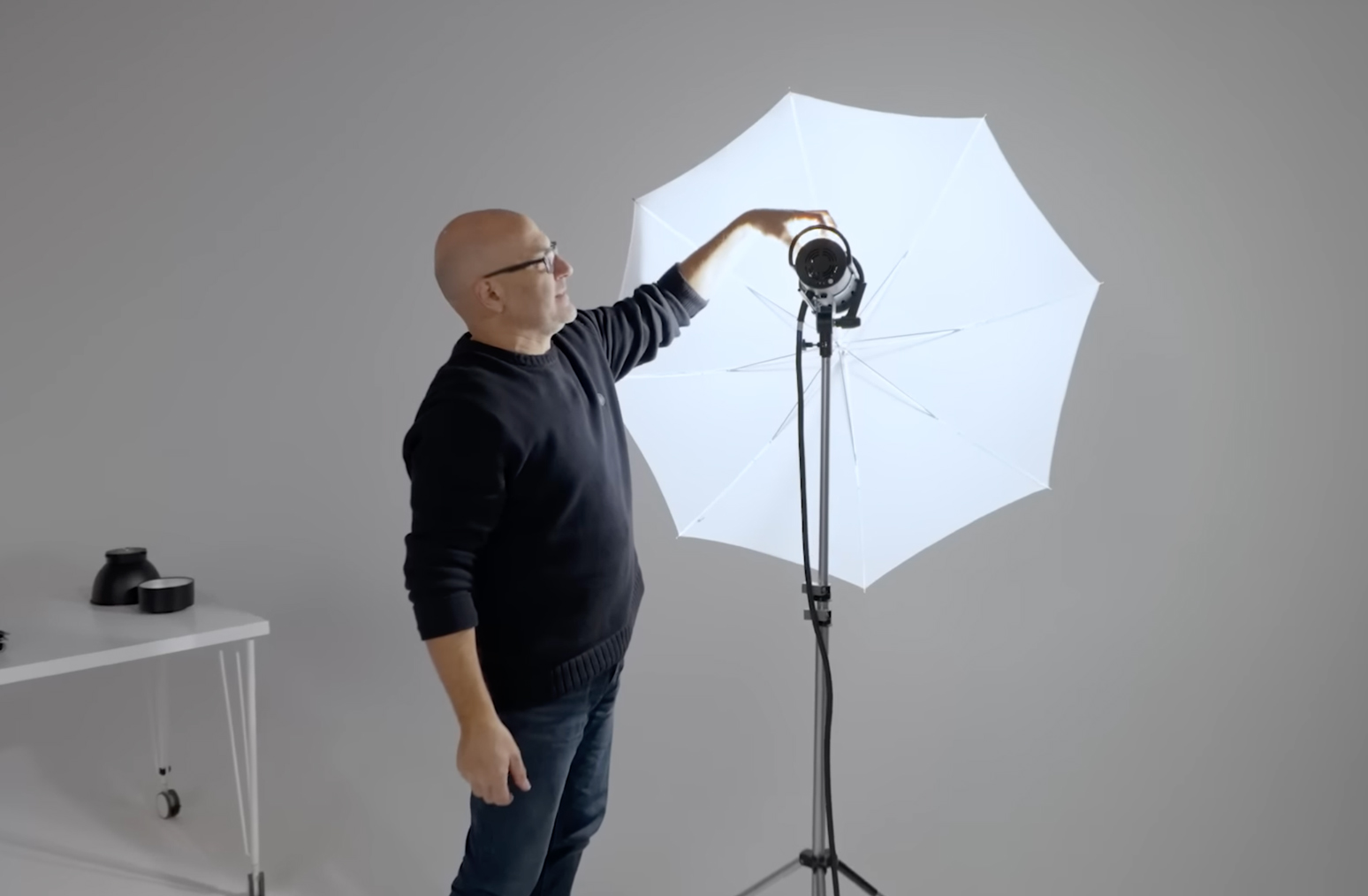 Karl Taylor discusses white umbrella with studio light