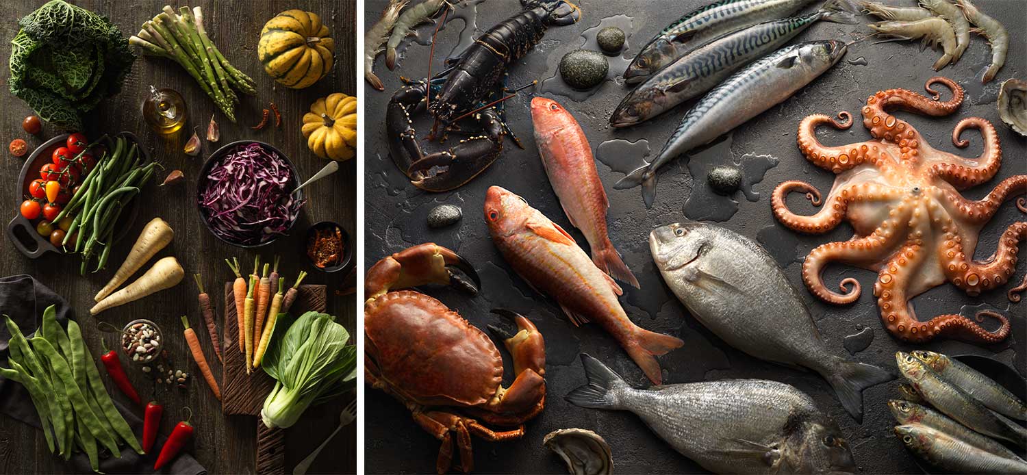Two Photos, one a flat lay of lots of different vegetables on a dark wooden background and the other of lots of different seafood on a grey slate base 